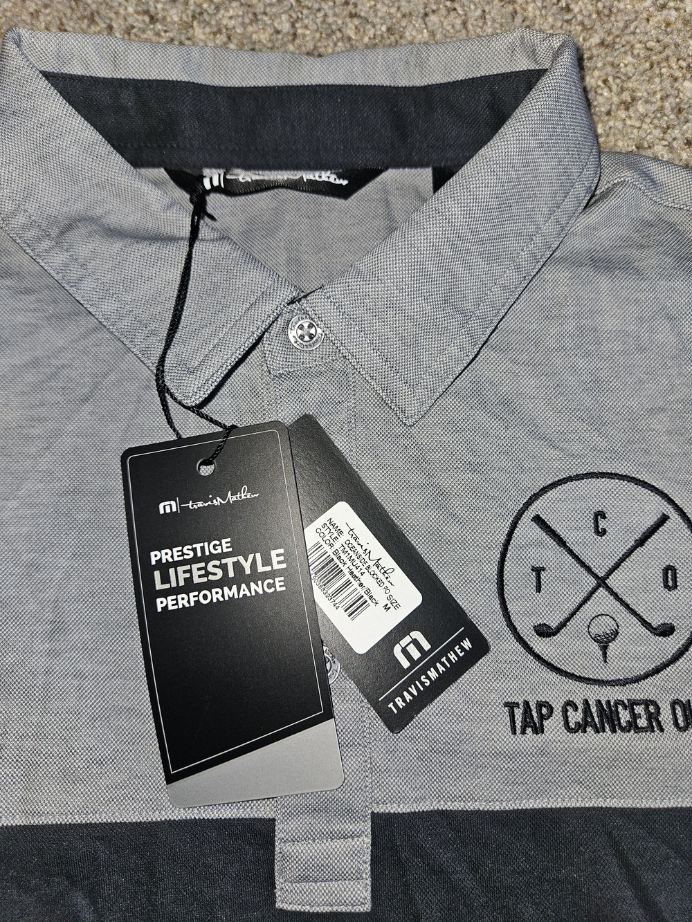 Travis Mathew Men’s Gray Polo Shirt - Tap Cancer Out Edition
